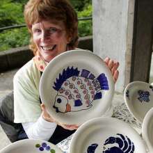 Blueberry Festival participant selling plates