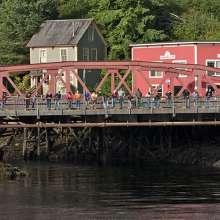 Fishing for salmon on the Stedman Street bridge near Creek Street