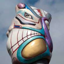 Artist Stephen Jackson's Native themed pile cap at Thomas Basin Harbor in Ketchikan