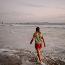 person walking on a beach