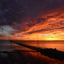 Sunset after a storm looking over the James River Bridge