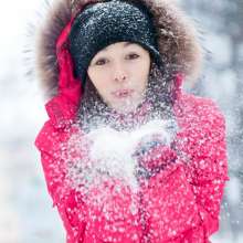 Woman Playing in NY Snow