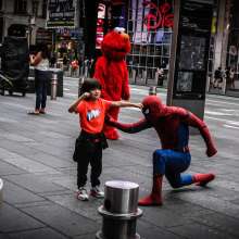 Spiderman and child playful fight