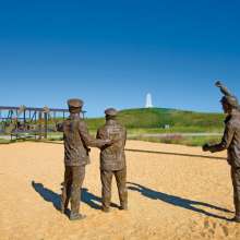 Bronze statue of the Wright Brothers Memorial First Flight in Kill Devil Hills in the OBX