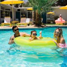 Family in pool.