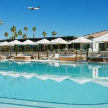 Palm Springs Surf Club Lazy River Pool Bar and pool.