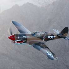 Palm Springs Air Museum plane in the air.