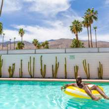 Man in pool at the Marley Hotel in Palm Springs