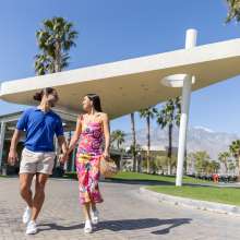 Couple walking at Escena golf resort.