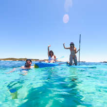 Charter 1 Guests enjoying a kayak and SUP experience