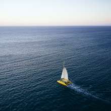 Charter 1 yatch drone view at sunset