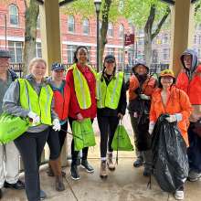 A group posing outside while volunteering for Pick Up The Poconos