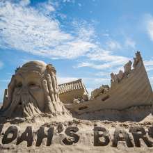 Noahs ark sand sculpture with only dogs in the boat, "Noahs Bark".
