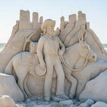 Man and Donkey Sculpture