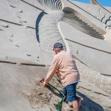 Sculptor Working on Art