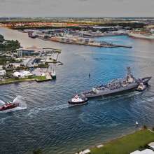 The U.S.S. Paul Ignatius makes her way through the entrance channel at Port Everglades.