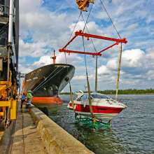 Yacht lifted off ship