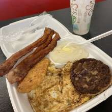 Eggs, Grits, Bacon, sausage and a hash brown.jpg