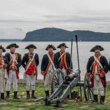 Rev Fest 250 soldiers in line behind cannon