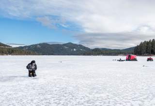ice fishing crew out on sheridan lake in the black hills of south dakota