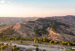 drone shot above the M on hanson-larsen memorial park for School of Mines in Rapid city south dakota