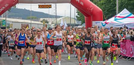 Entrants running off the starting line at the Swansea Bay 10k