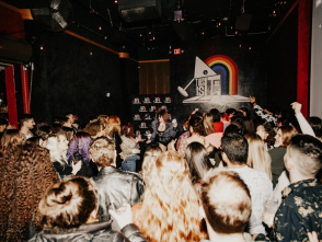 Interior image of This Is It! During a DJ set