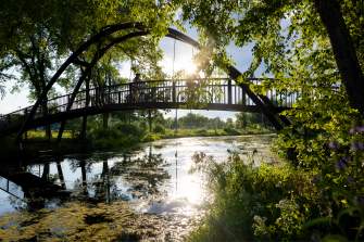 An image of the bridge that goes over the Yahara River at Tenney Park.