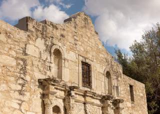 Upper portion of Alamo's facade.