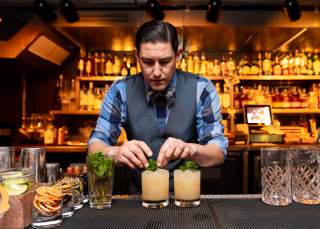 The Ostrich - Bartender preparing craft cocktails