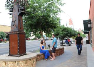 People Sitting On Downtown Chandler's Tree-lined Walkways