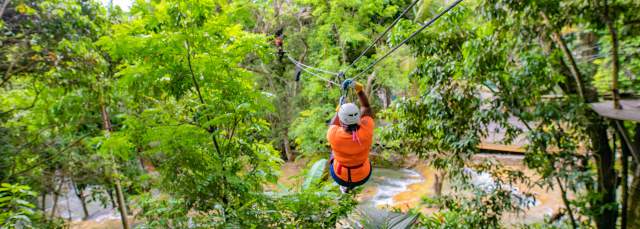 Image of a person zip lining