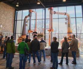 A tour takes place inside the Town Branch Distillery.