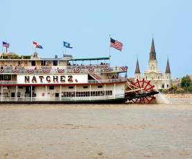 On this Sunday brunch cruise, travel along the Mississippi River while enjoying live jazz music and savoring a lovely buffet brunch, if option selected. Otherwise, sit inside in one of our elegantly appointed decks or sit outside on one of our outdoor decks and enjoy the sites and breezes of the Mississippi River. This authentic paddle-wheel riverboat will whisk you away to the romance and ambiance of yesteryear. The Steamboat NATCHEZ is taking some time off, but her sister vessel, the Riverboat CITY of NEW ORLEANS will be taking her place. You’ll get the same authentic riverboat experience of a leisurely, two-hour cruise on the mighty Mississippi, enjoying traditional live jazz, craft cocktails, and all the beautiful New Orleans sites, while also exploring the newly renovated riverboat. Make sure you check out all four decks - the top deck view is a sight to see! Upgrade your ticket to include the brunch buffet.