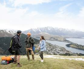 Couple paragliding from Bobs Peak