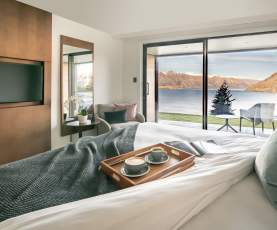 Double room at Kamana Lakehouse with lake and mountain views