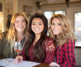 Friends drinking wine at WaterTower Winery