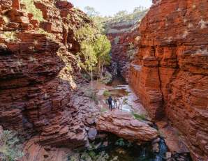 People standing in Joffre Gorge, Karijini National Park