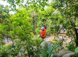 Image of a person zip lining