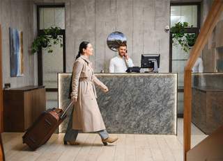 Business woman walking in hotel