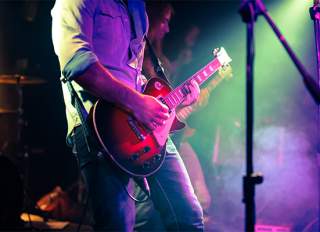 Man playing an electric guitar
