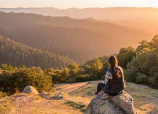 Girl looking out to the horizon at  La Honda Creek