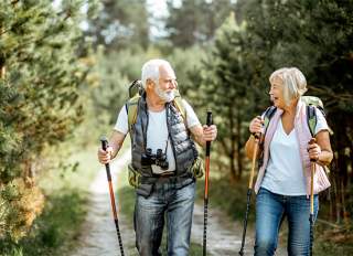 Senior couple hiking outdoors