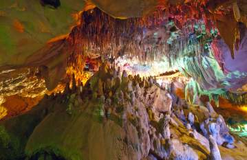 Colorful lights enhance a trip into the caverns at Florida Caverns State Park.