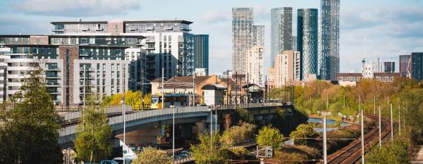 Skyline with train tracks leading into city centre with skyscrapers
