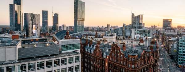 Skyline of Manchester with the Midland Hotel in the foreground and skyscrapers in the background