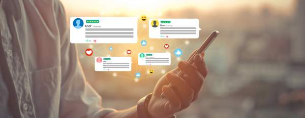 Person using a smartphone with positive customer feedback icons and ratings floating above, representing a seamless and engaging government customer experience.