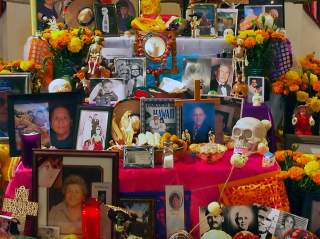 Day of the Dead altar with photos