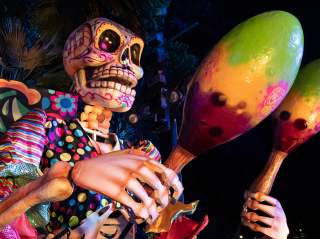 Statue of skeleton holding maracas