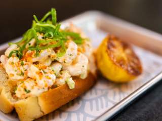 Lobster roll with side of lemon
